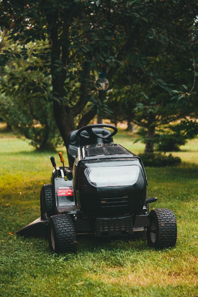 black ride on toy car on green grass field during daytime